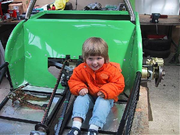 Charlotte
                (aged 3) tests out the ride to school!