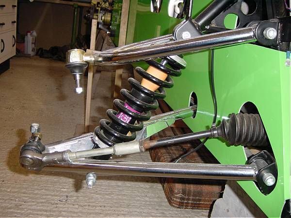 Upper ball joint socket points uphill so to speak.