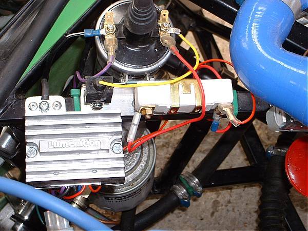 Ballast, powerpack , coil and condenser all on one
                bracket...neat!