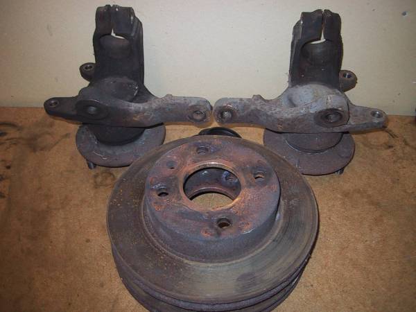Rusty front uprights and discs.