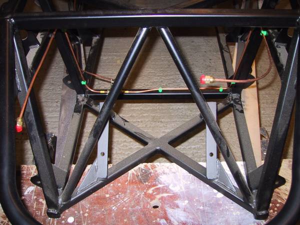 Brake pipes not in final position.